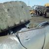 Взорвавшееся колесо «БелАЗа» расплющило легковушку (ФОТО)