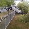 В Набережных Челнах автомобиль повис на заборе после аварии